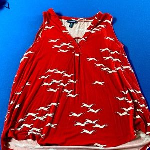 Slightly used, has small worn holes at belt line